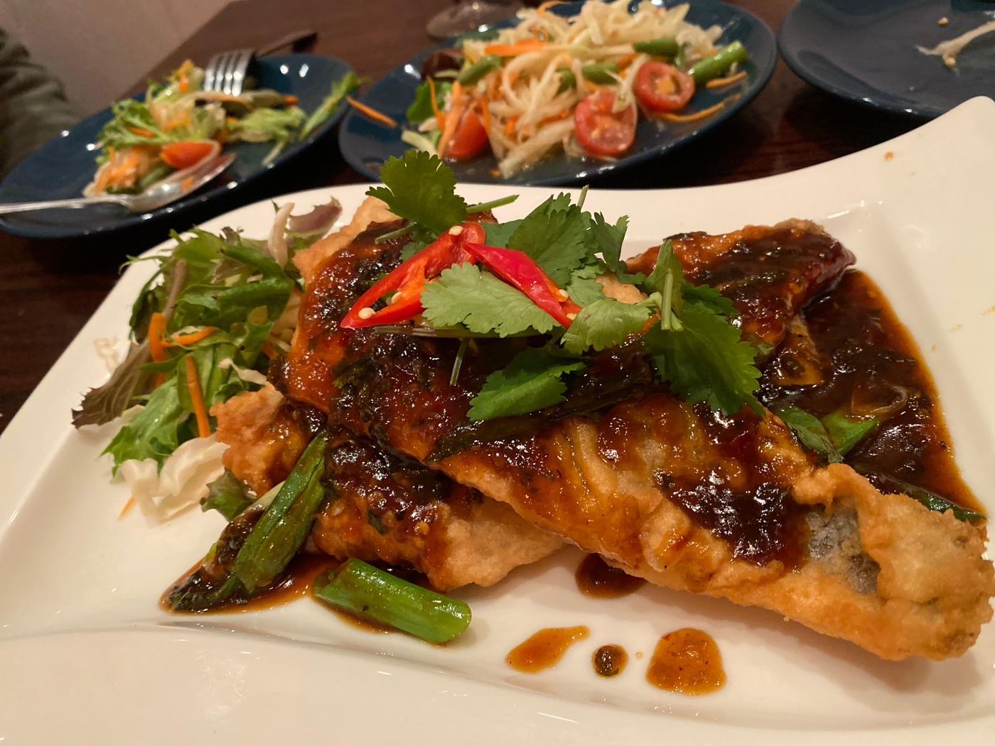 Crispy fish with tamarind sauce, plated at Chart Thai